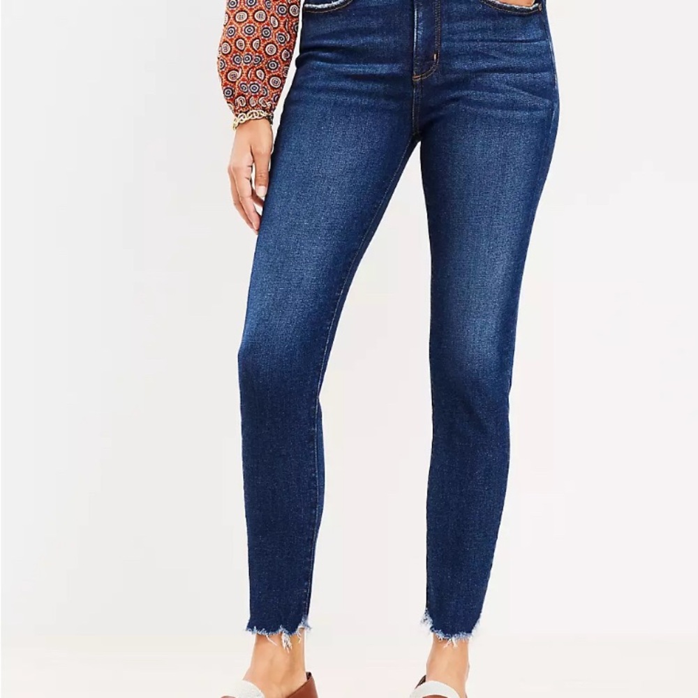 LOFT dark wash skinny jeans with chewed hem. Size 10